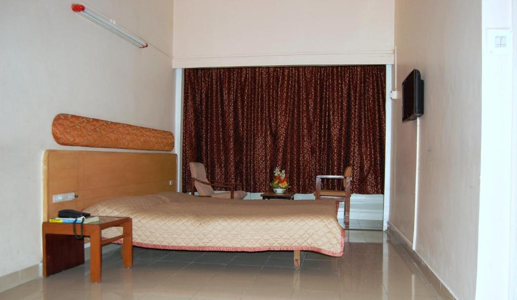 Hotel Raviraj Púna Szoba fotó